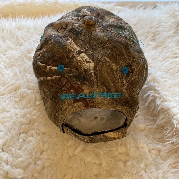 Women's Realtree Baseball Cap Camo with teal trim. - Picture 6 of 8